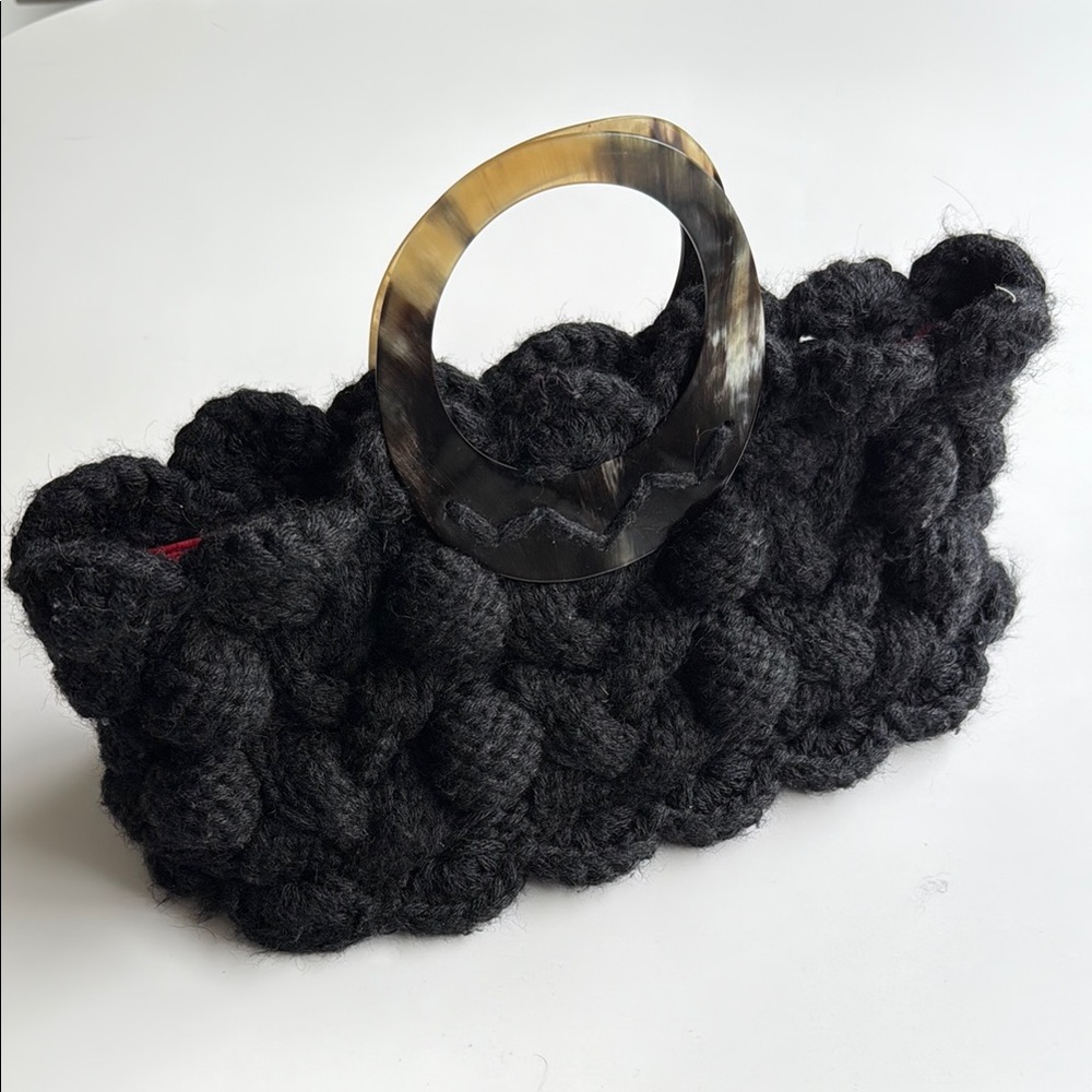 Cableknit crochet purse by Meche Correa for e bella chunky knit bag